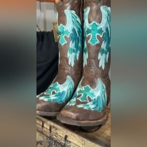 Elegant Brown and Teal Heeled Boots